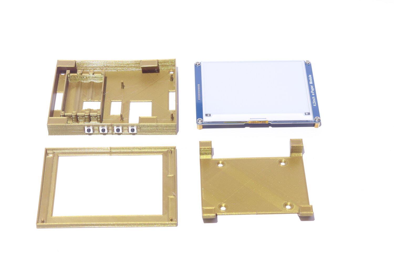 Exploded view of the Tinta kit: 3D-printed case parts and the e-paper module